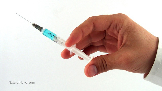 Holding-Syringe-Needle-Vaccine-2